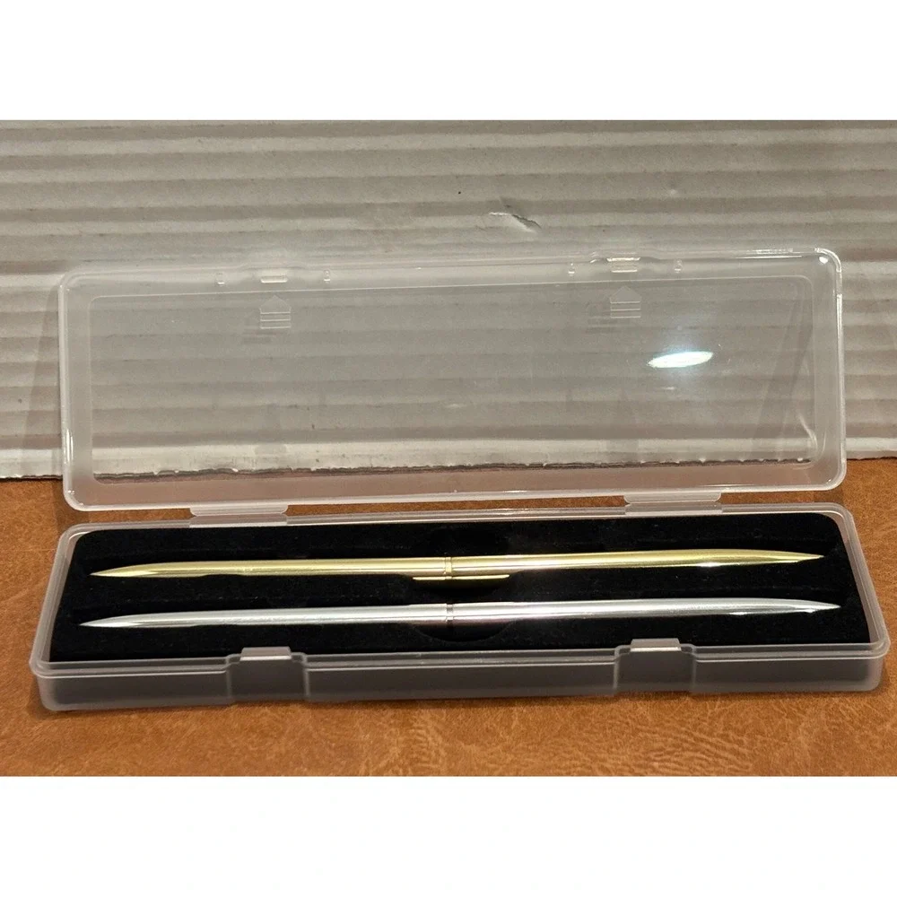Vintage Slim Minimalist Metal Twist Pens 1 Gold and 1 Silver with storage case.